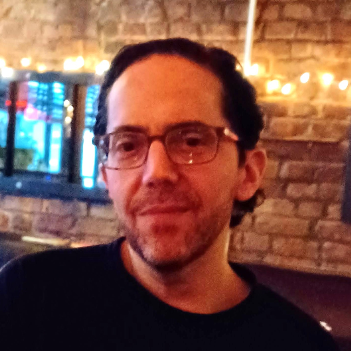 Headshot of Jason Arnold